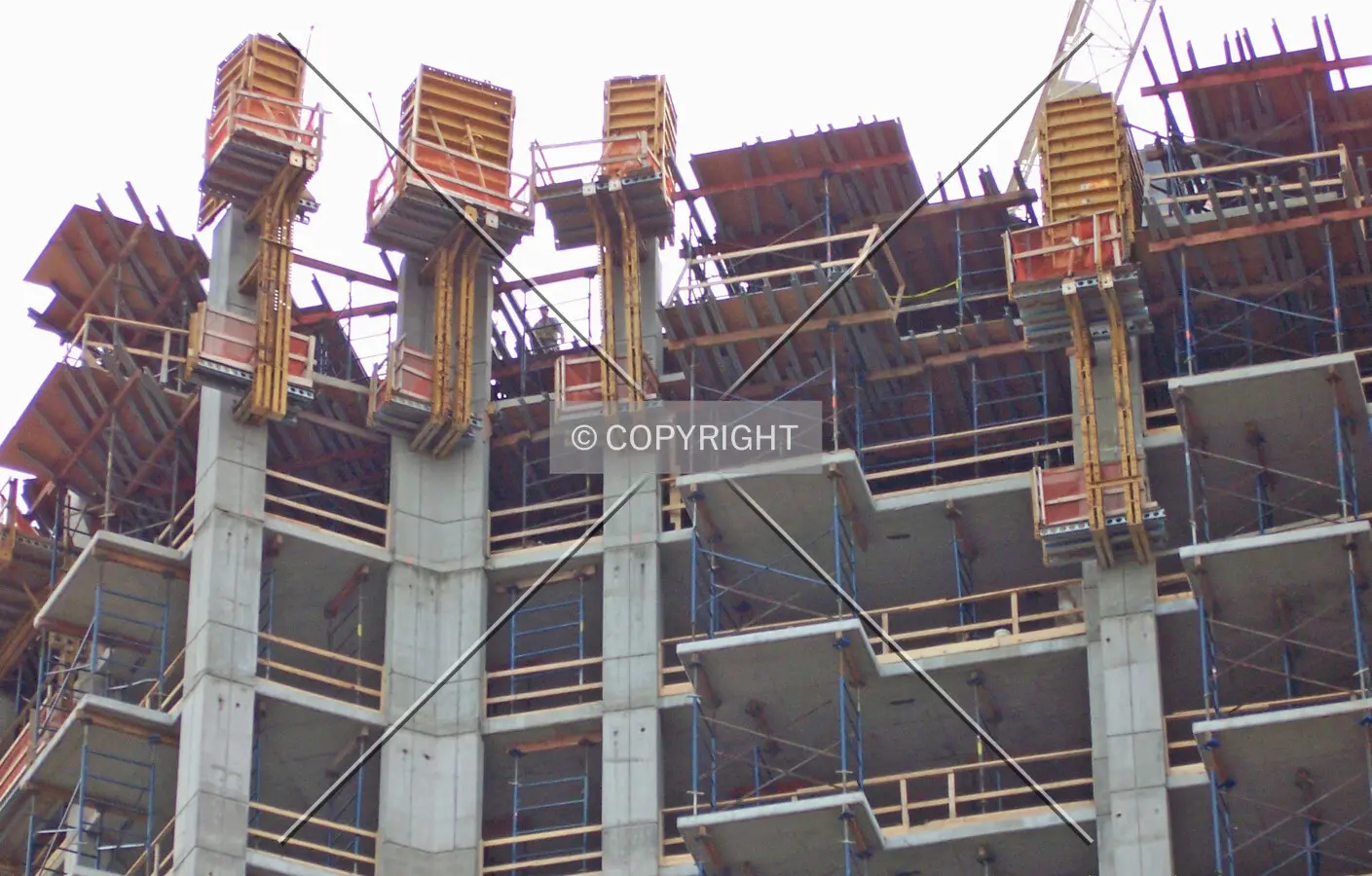 Concrete formwork and scaffolding at the top of the southeast wing