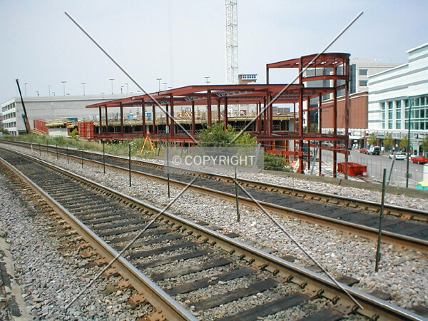 View of construction site from adjacent Metra rail tracks