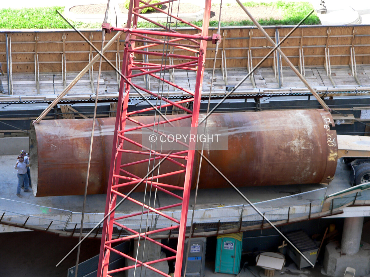 Removing a caisson top from a flatbed truck