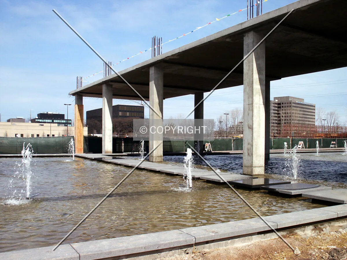 Fountain, colonnade, and stepping stones