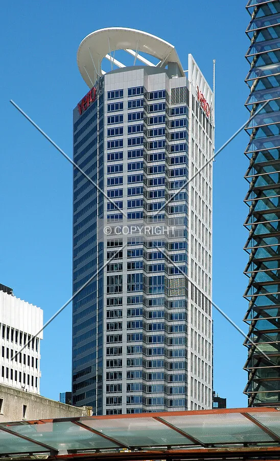 The building soars above the bus interchange