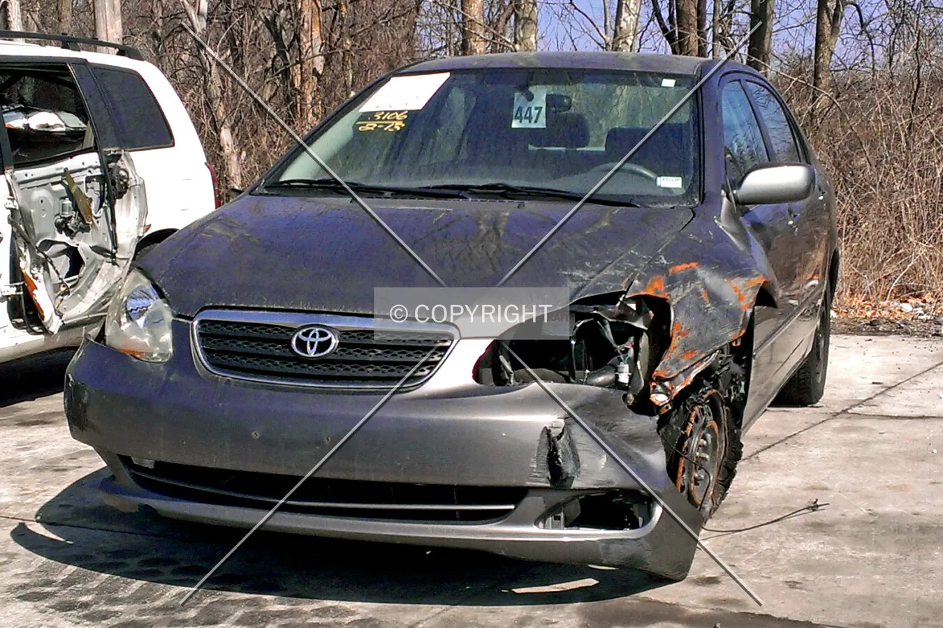A wrecked Toyota Corolla; March 9, 2014
