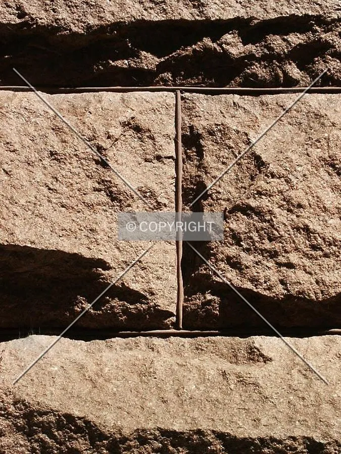 Close-up of the granite blocks at the base