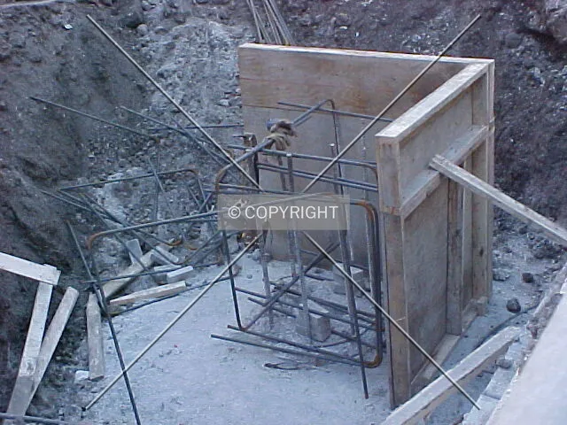 Top of a caisson with unfinished rebar and formwork