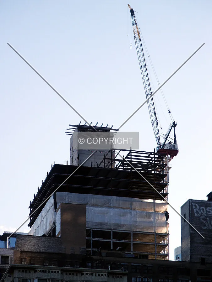 Upper floors, core, and crane seen from North State Street