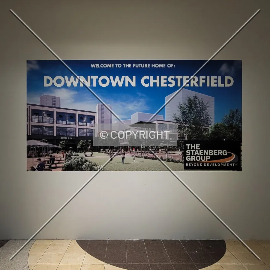 Rendering of the future development of the property hung on a temporary wall erected to close off the Dillard's wing of the mall; October 28, 2023