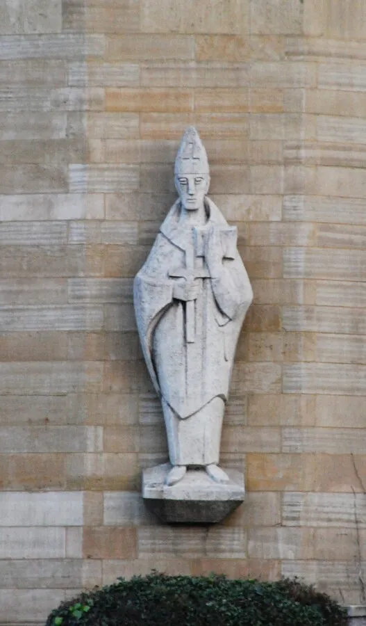 Statue of a saint on the church wall
