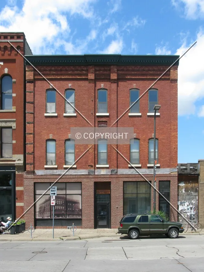 Full front elevation from across East Hennepin Avenue