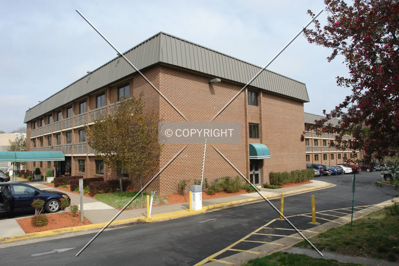 A brick building housing a hotel