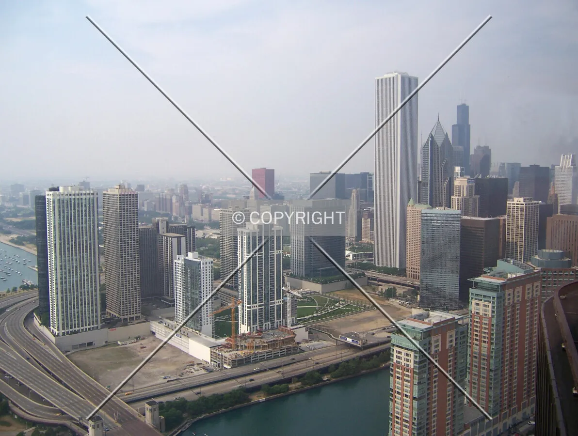 The Regatta in context with Lakeshore East; viewed from the Cite restaurant, on the 70th floor of Lake Point Tower on a hazy day