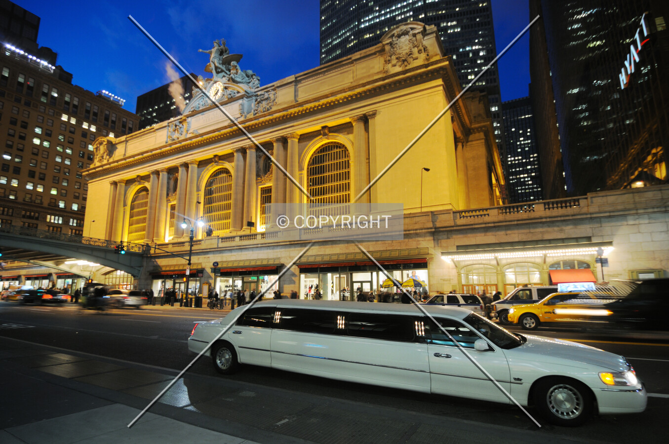 Limo car in front of Grand Central Terminal at night