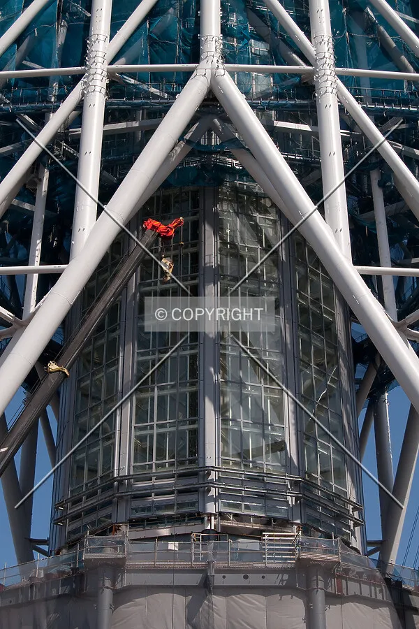 Top under construction at ground level before being raised into position