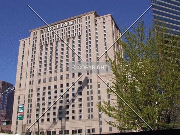 West façade, with the shadow of a tower crane on the Grand Plaza site
