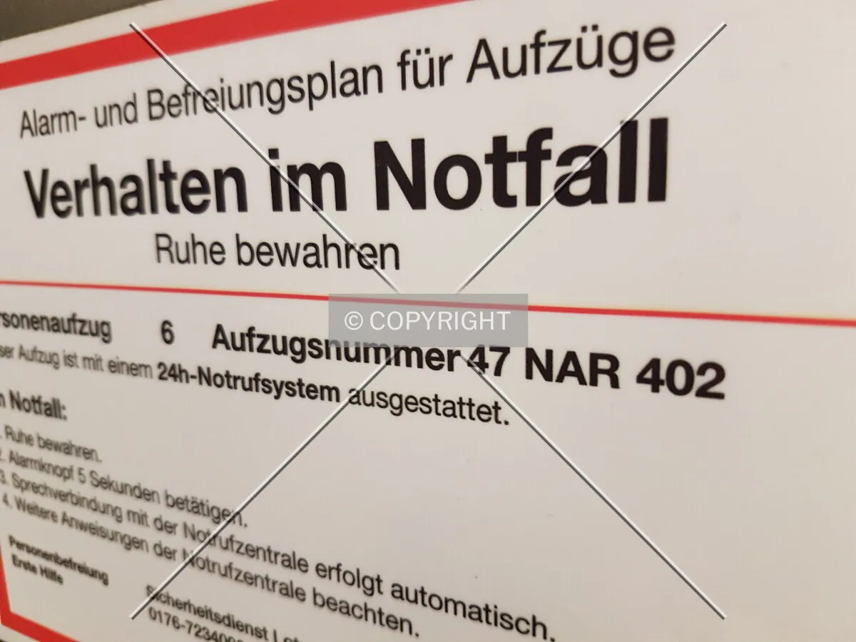 Identification sign in an elevator