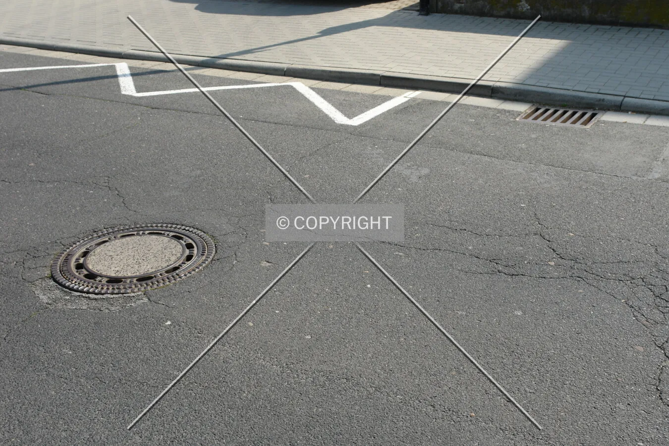 A street and two gully covers