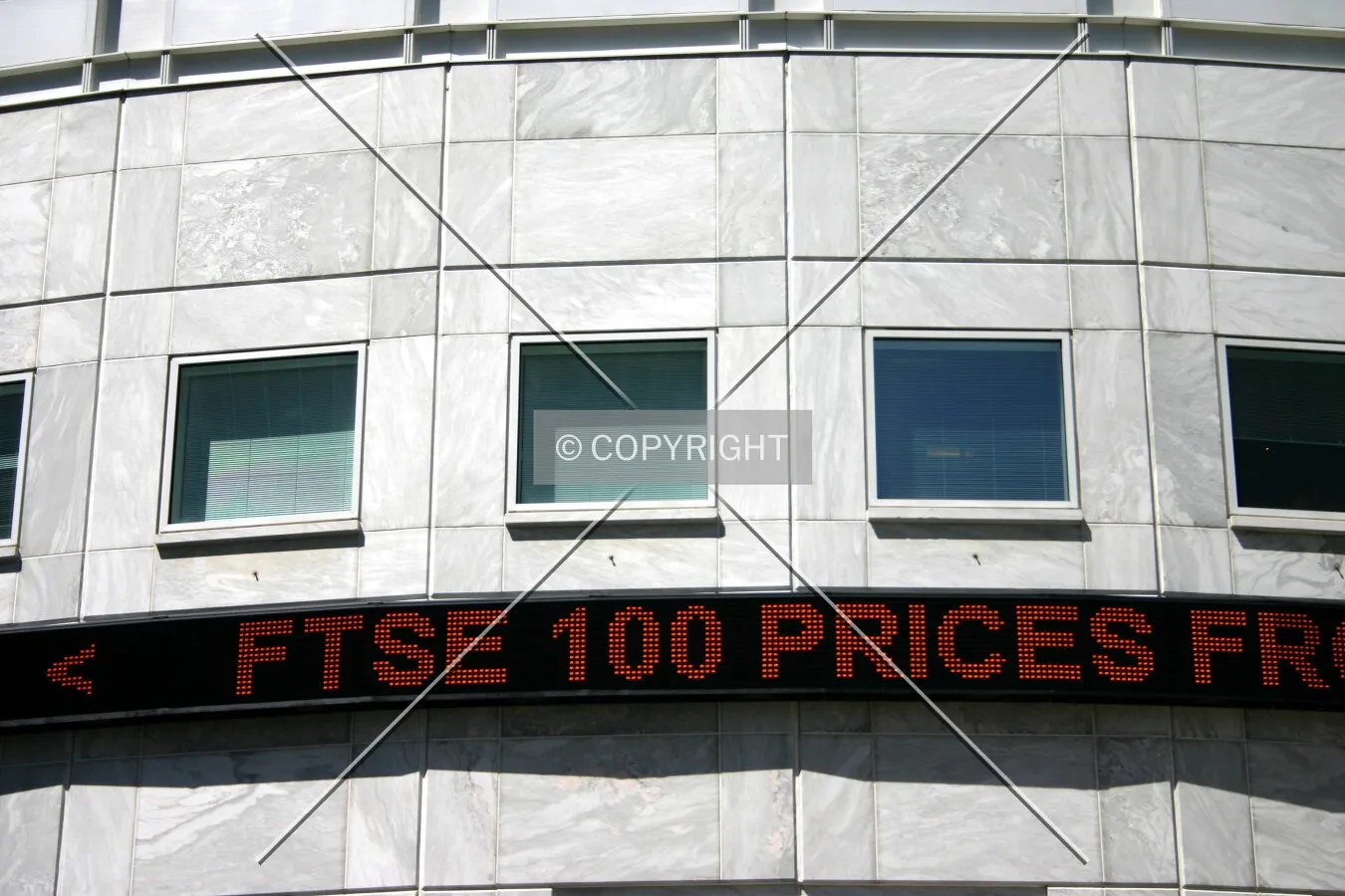 A share price ticker wraps around the southeast corner