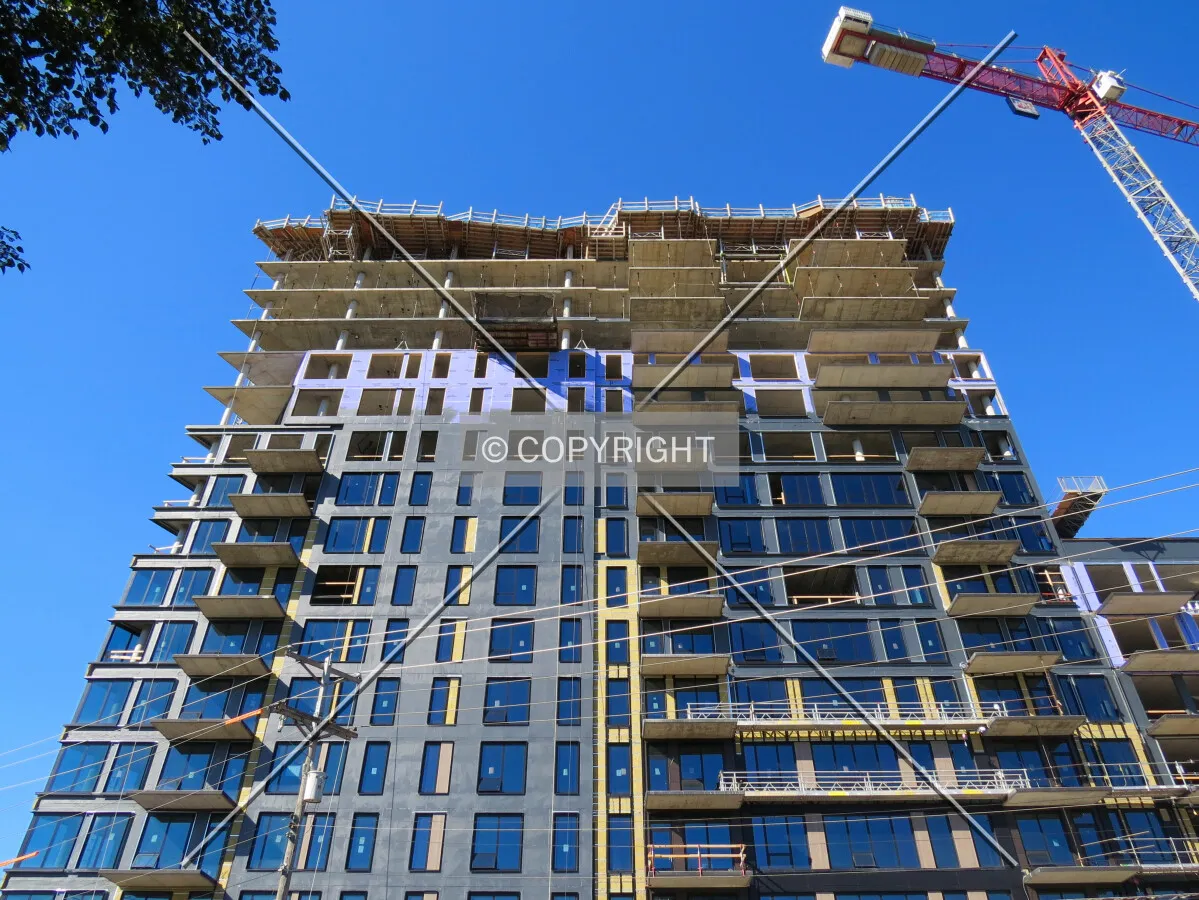 Looking up the taller south wing from 13th Avenue South
