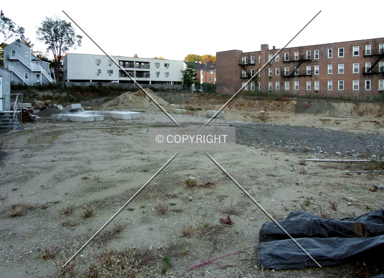 View from the southwest on Forest Street showing cleared lot before construction