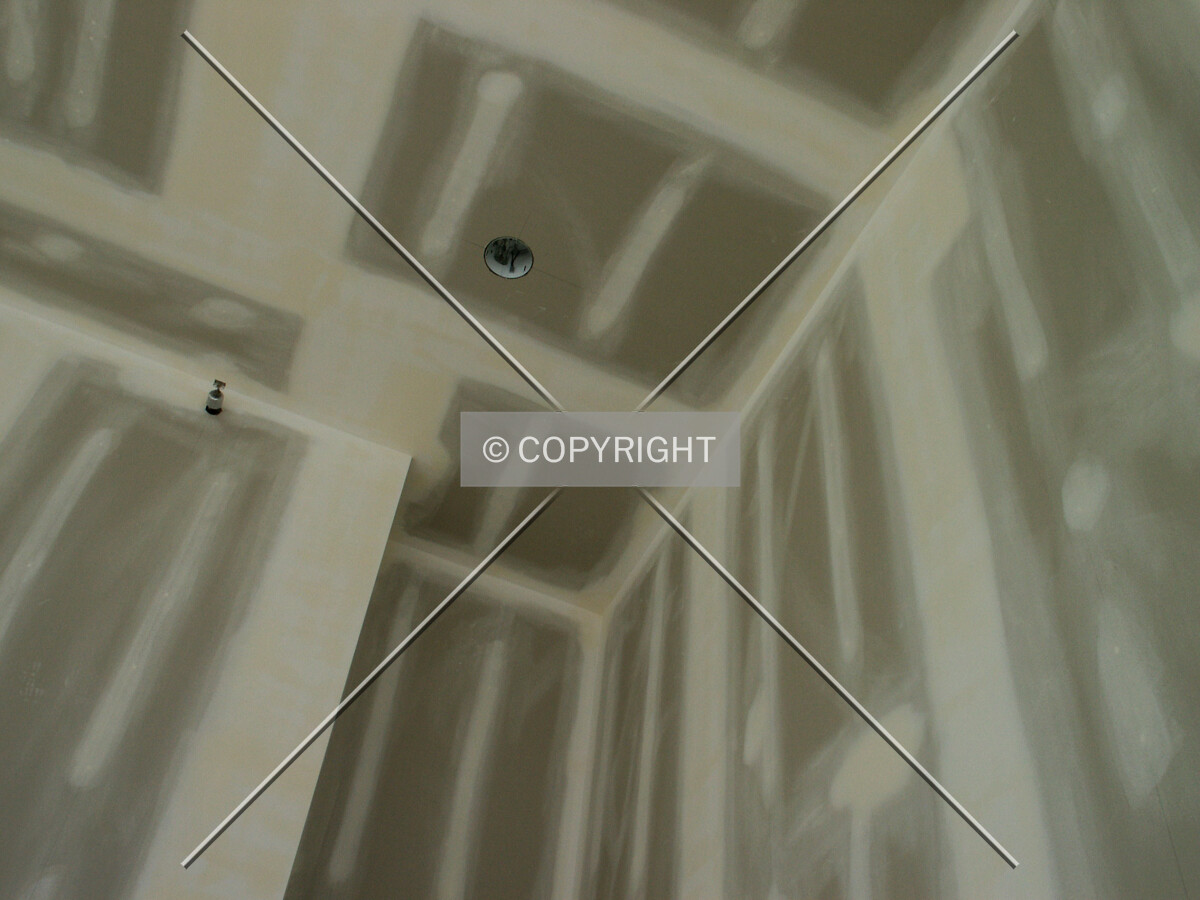 Drywall and primer in an 11th floor room