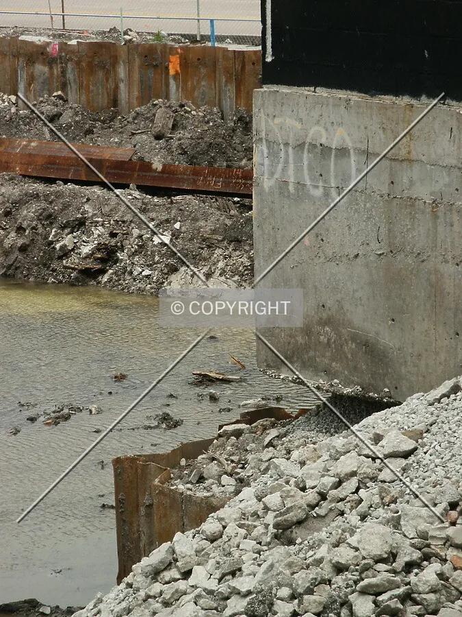 Corner of the Phase II clubhouse overhanging the excavation