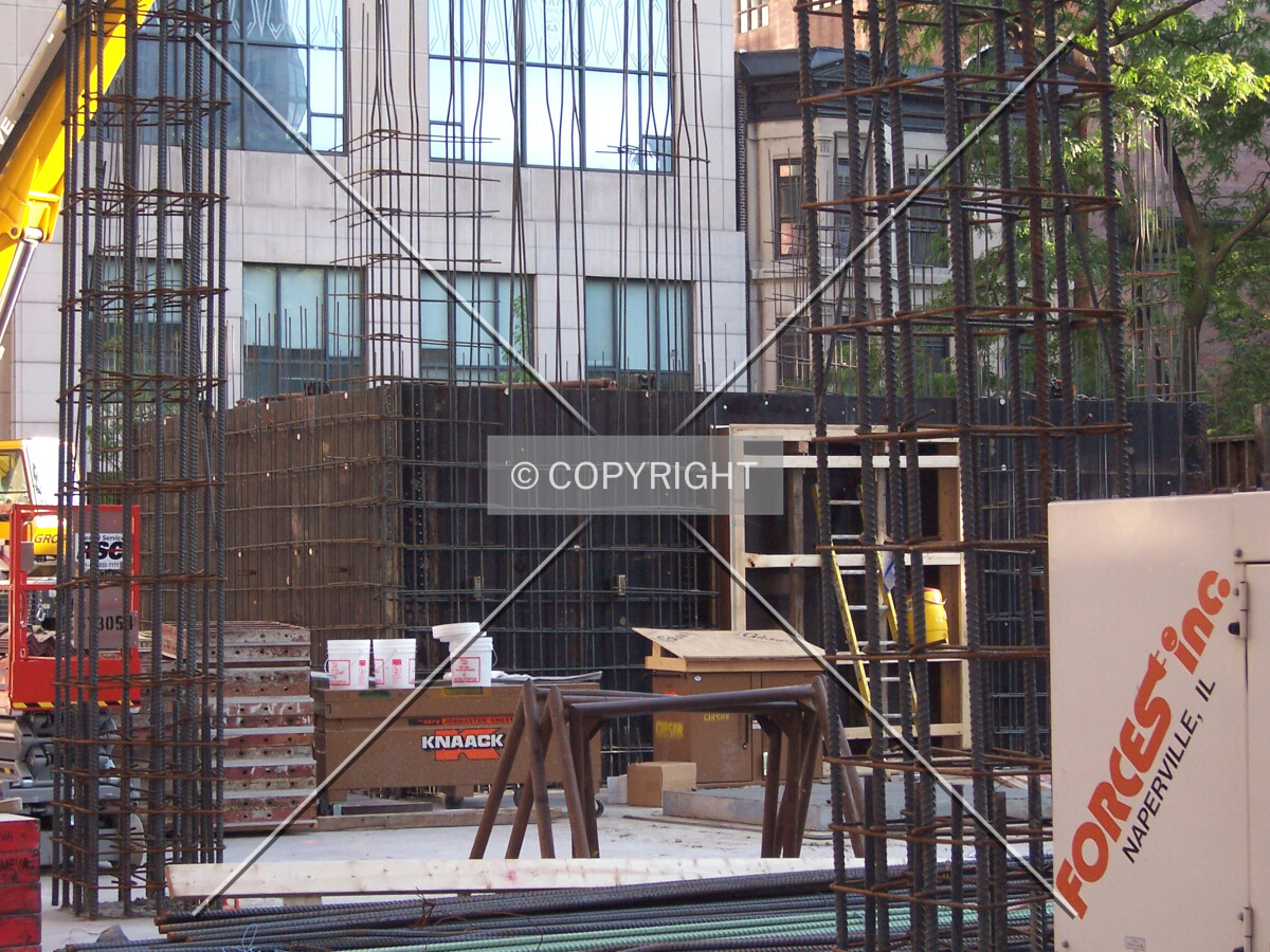 Looking southwest into the site. The wall in the background is the base of the elevator core.