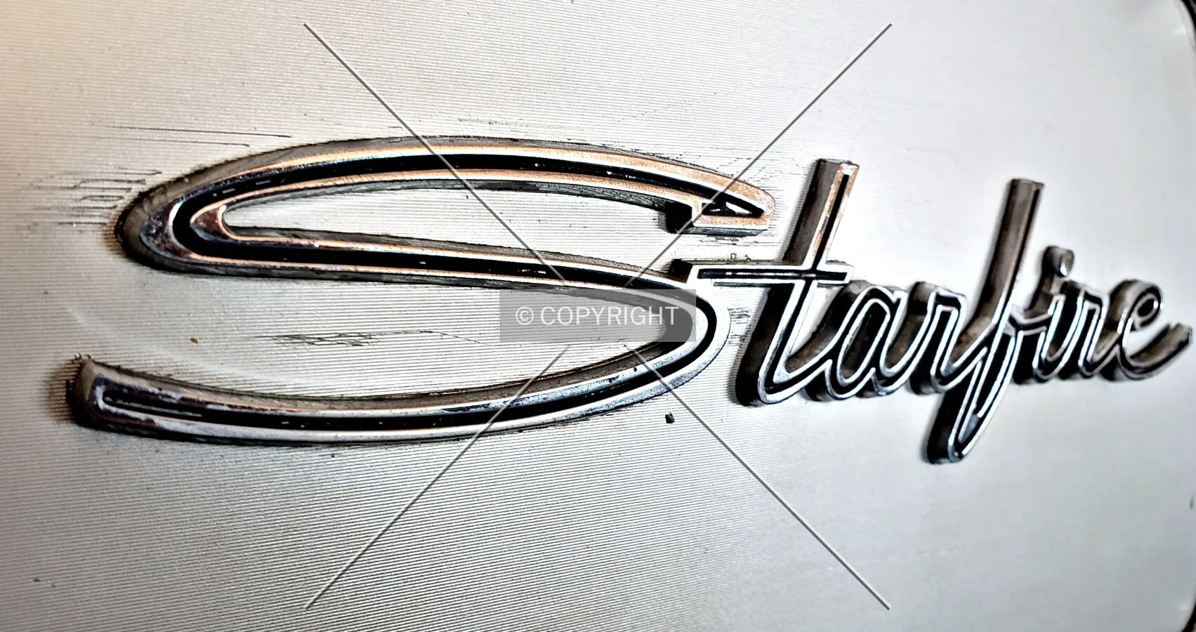 Oldsmobile Starfire logo