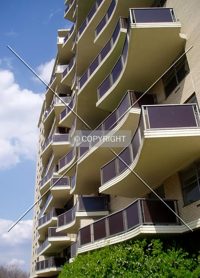 Brown balconies, here on the west side, distinguish this building from Toledo Tower