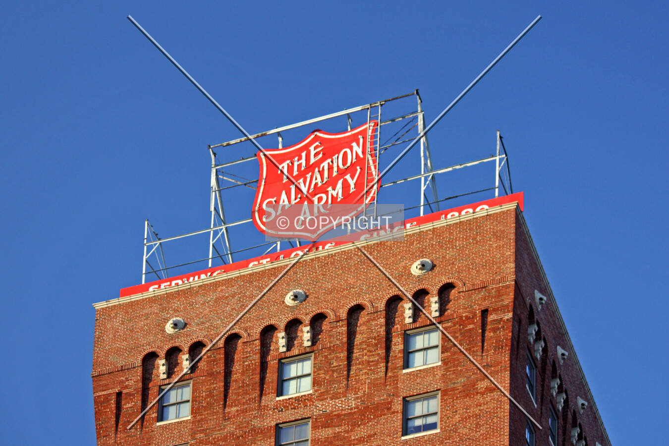 Upper floors and sign from the southeast