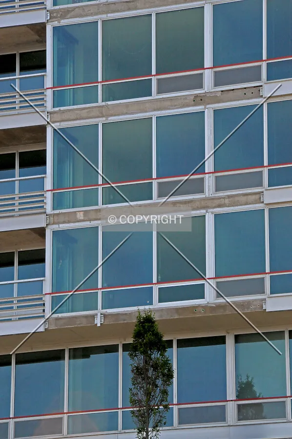 Portion of the north facade missing slab edge covers