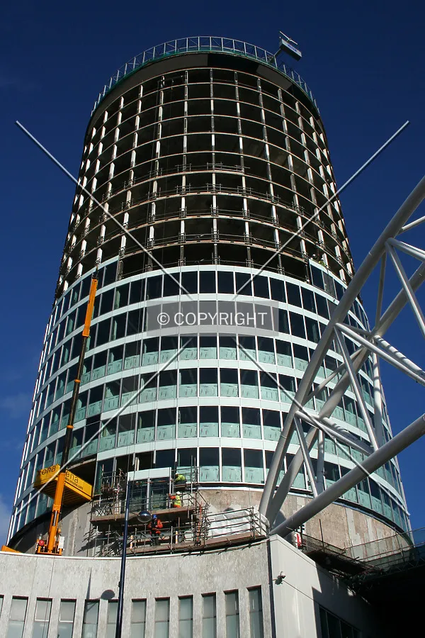 Looking up at the facade installation