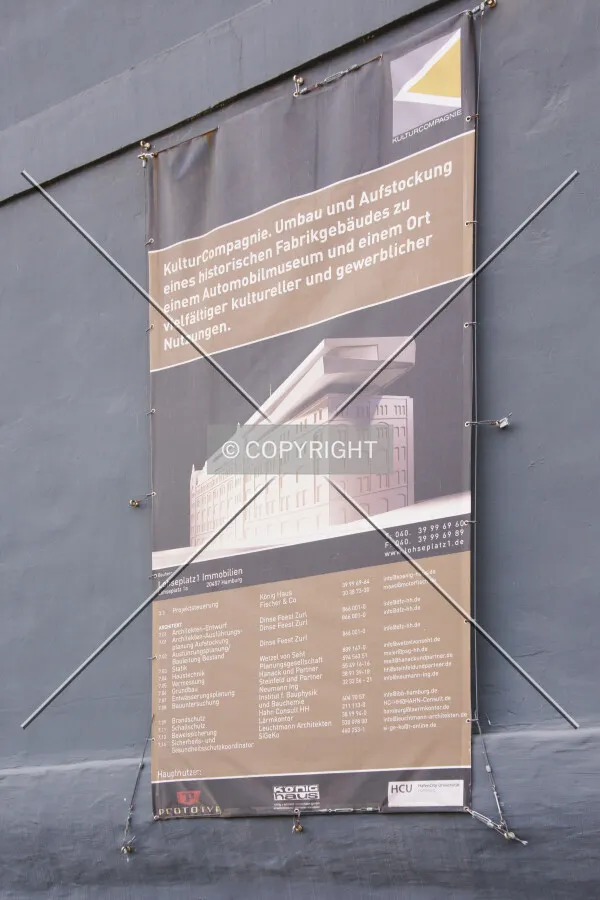 Construction propoal sign for the expansion of the building by an additional overhanging floor