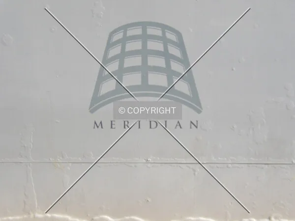 The building's logo on the construction fence off Main Street