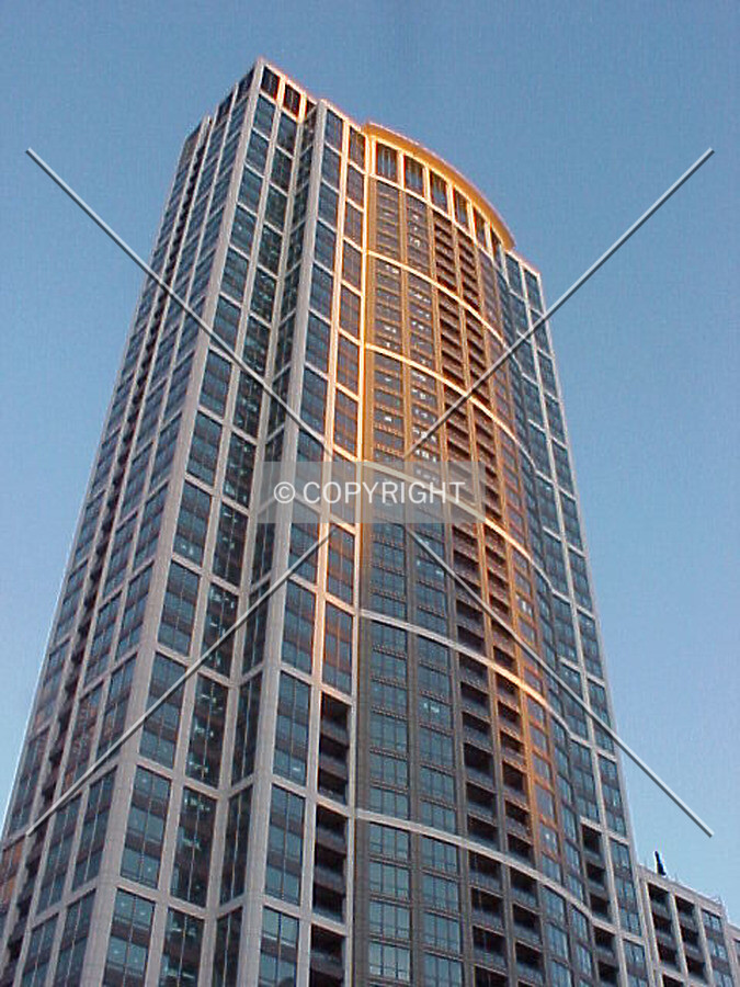Looking up at the western facade from the top of at parking garage at the corner of Wabash and Randolph Streets