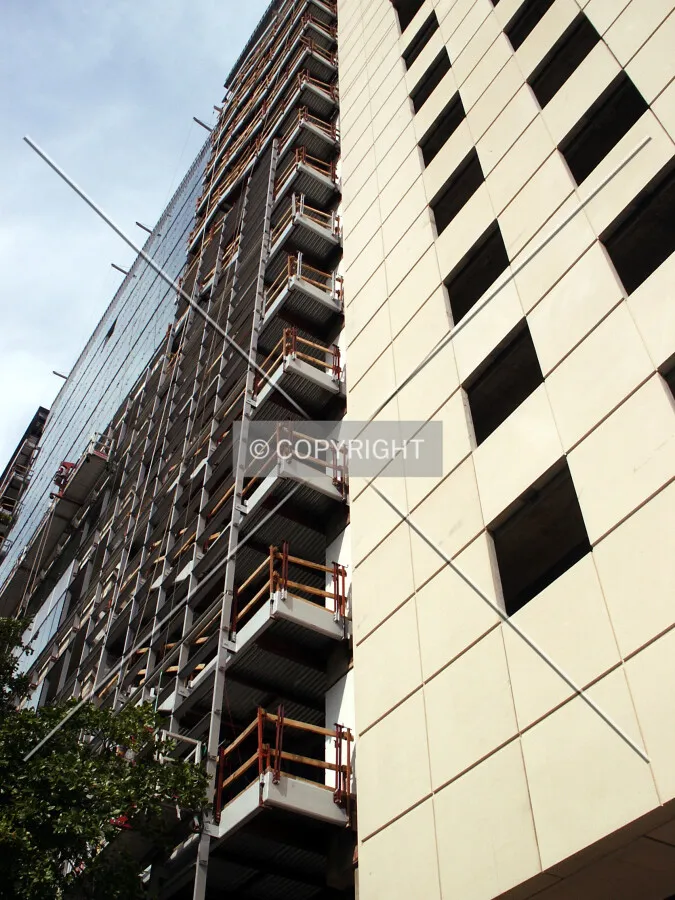 Looking up the Fannin Street facade
