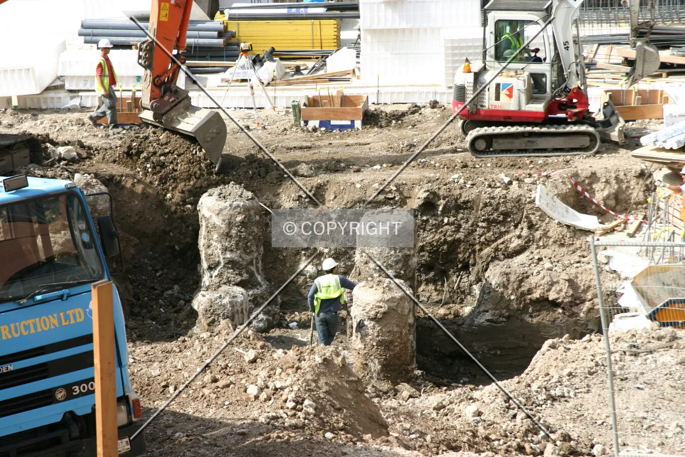 Elevated view of the pit showing remnants of a previous building