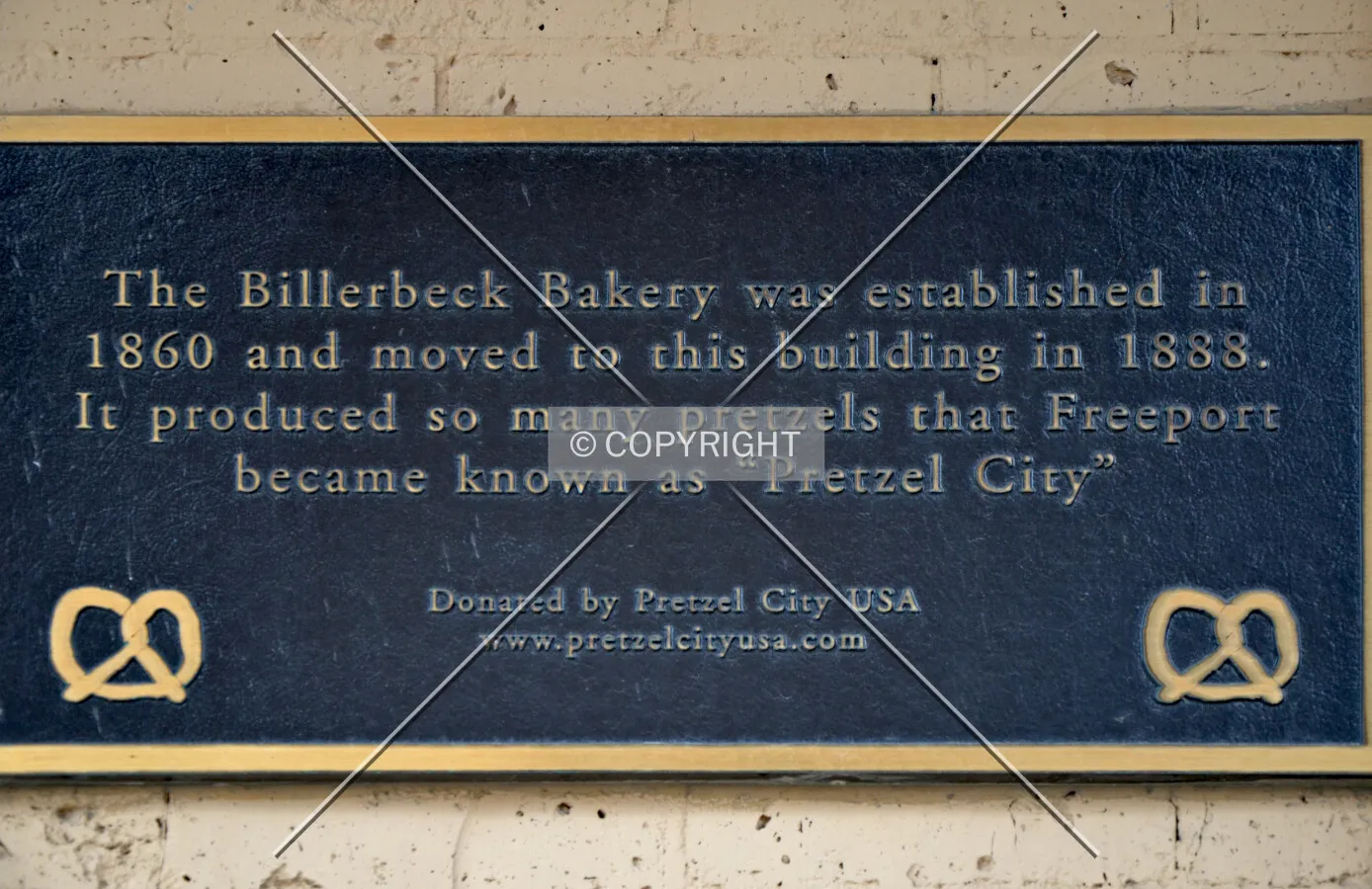 Historic plaque on the facade, November 23, 2012.