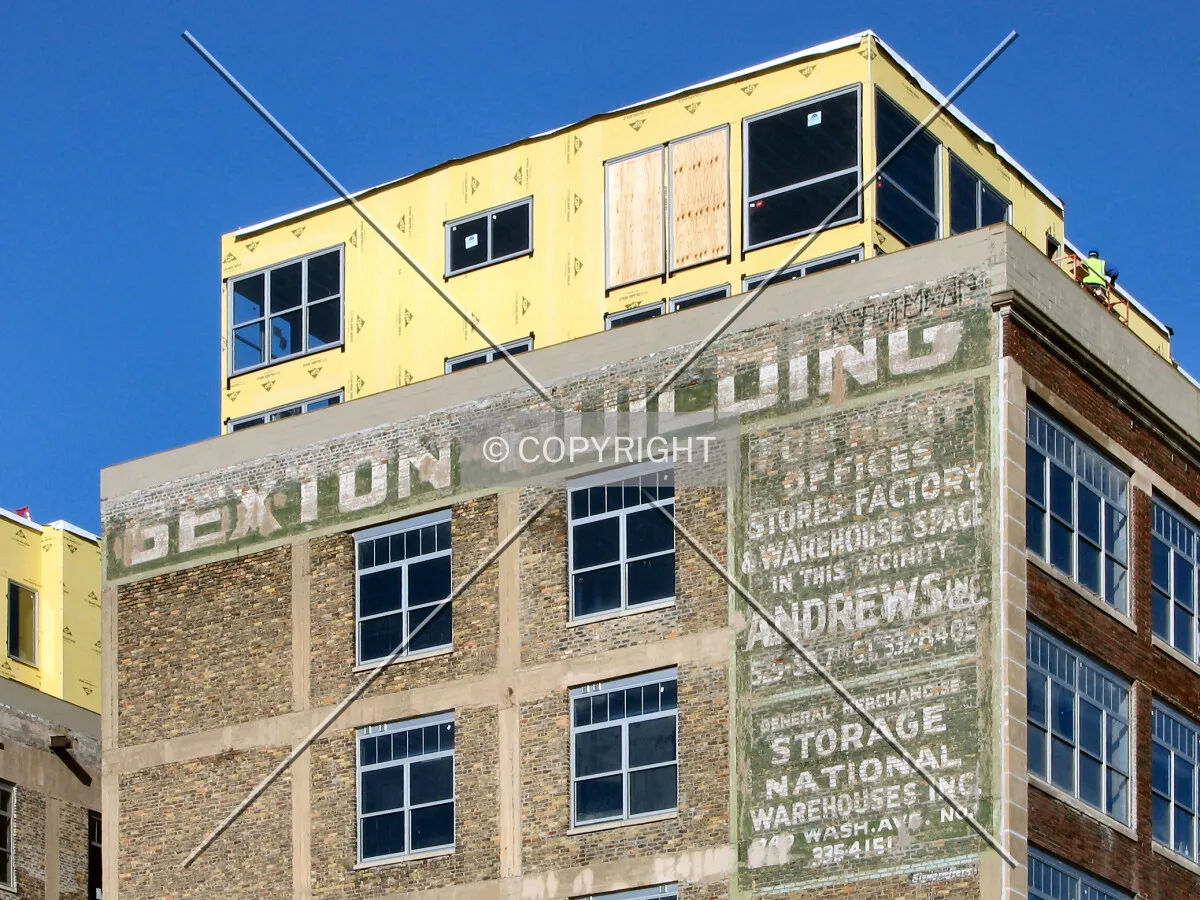 New penthouse above historic advertisement