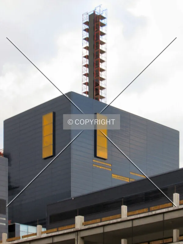 Scaffolding and yellow windows
