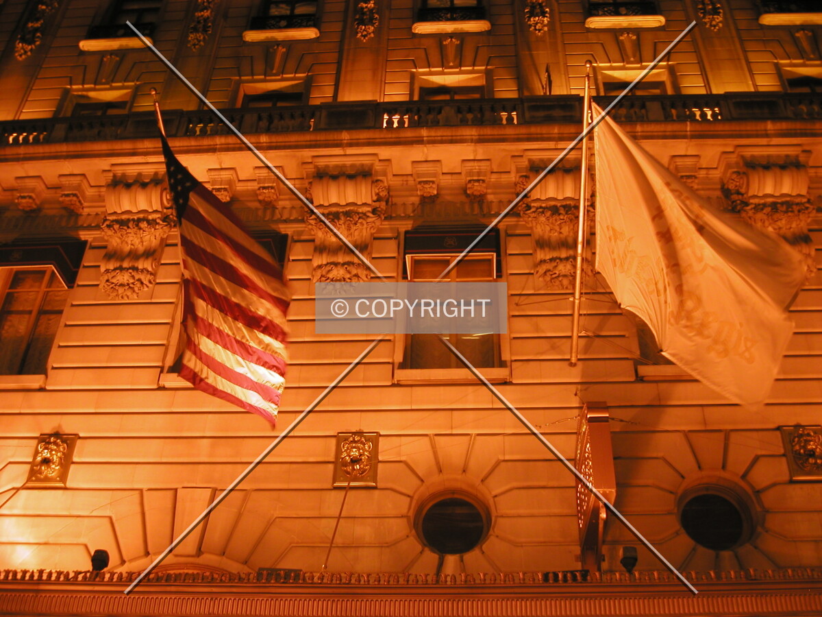 Flags in front of historical facade