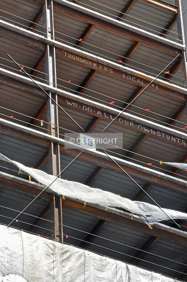 Pride among the ironworks is displayed in spray paint on the south side of the structure, reading "Ironworks Local 1, We do all our own stunts."