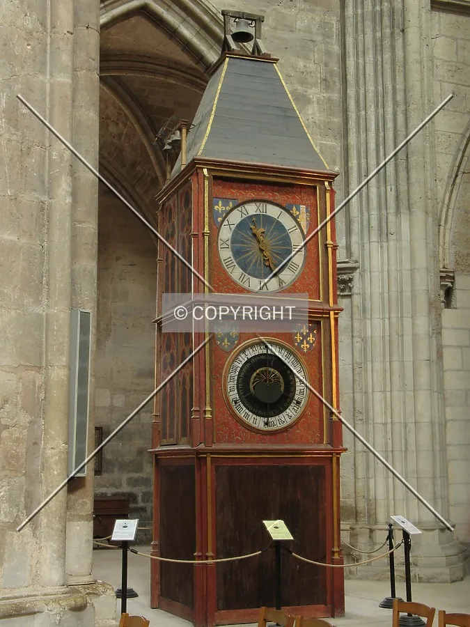 Famous astronomical clock located at the entrance of the south side of the nave