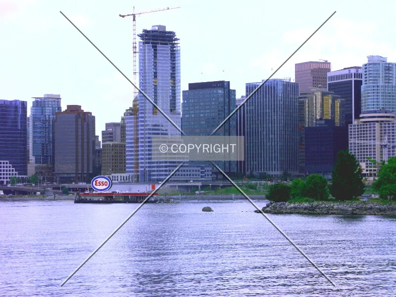 Shaw in relationship to the skyline from across Coal Harbour