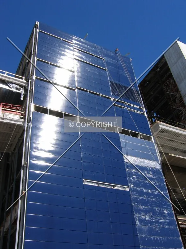 Looking up the new facade, from 2nd Street South