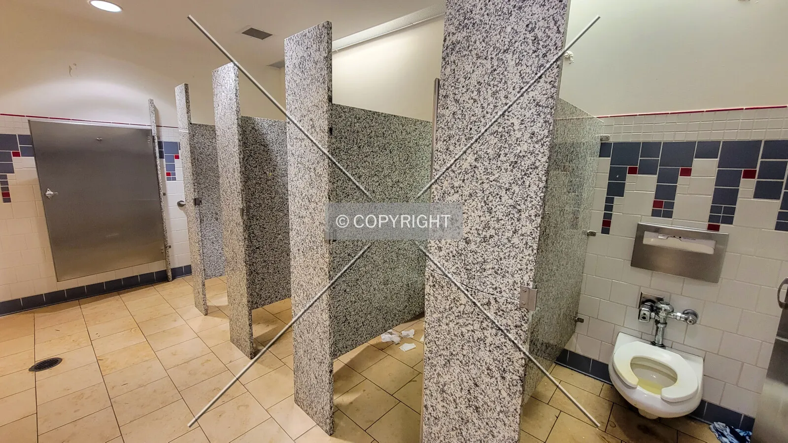Toilet stalls in the men's Food Court restroom; October 26, 2023