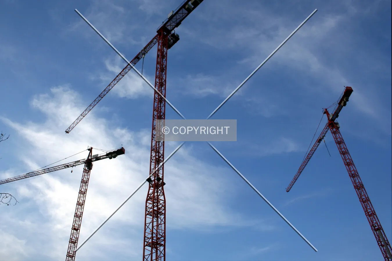 Three tower cranes