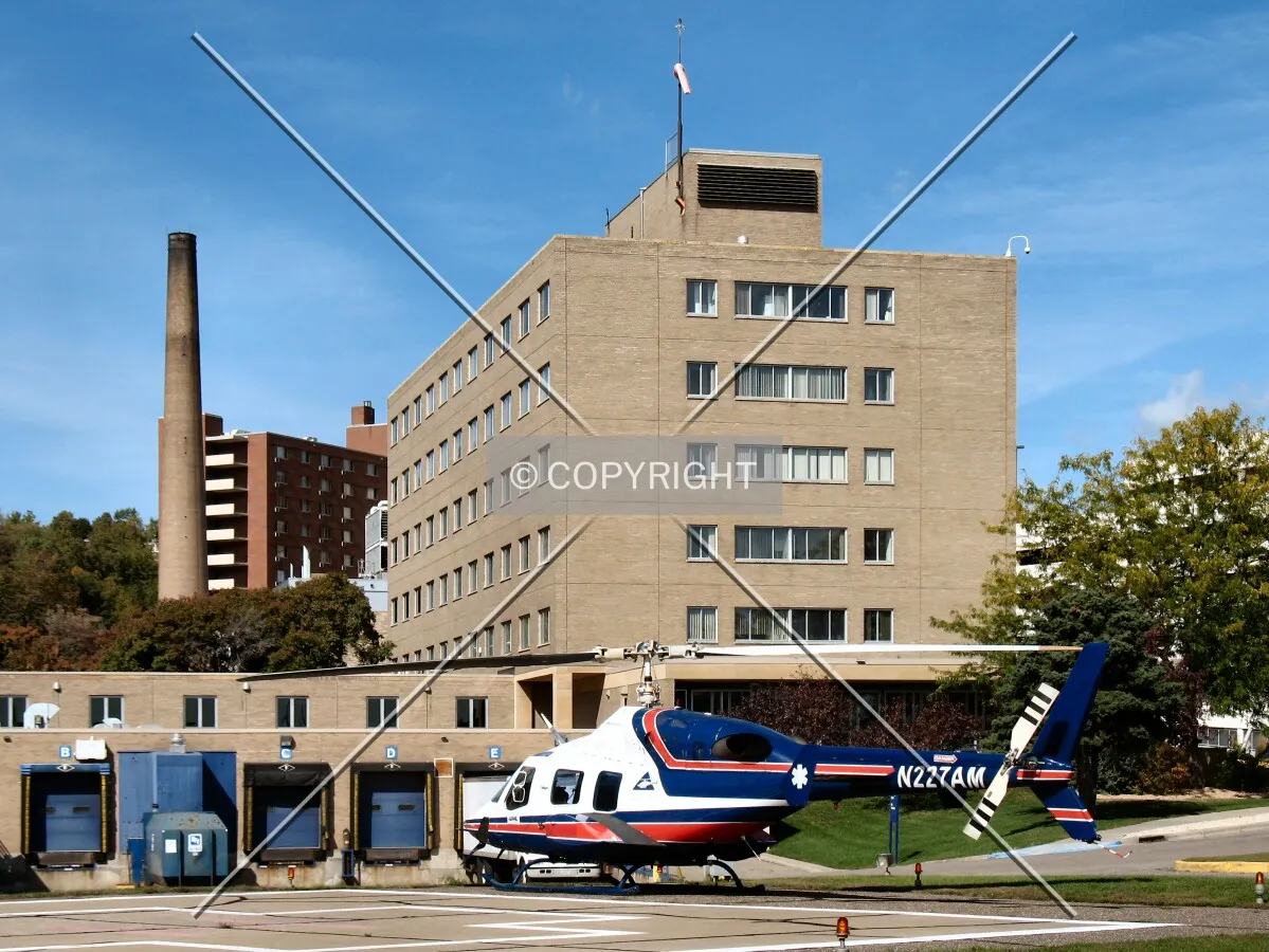 View to the north from East 12th Street, with helicopter ambulance waiting on the landing pad