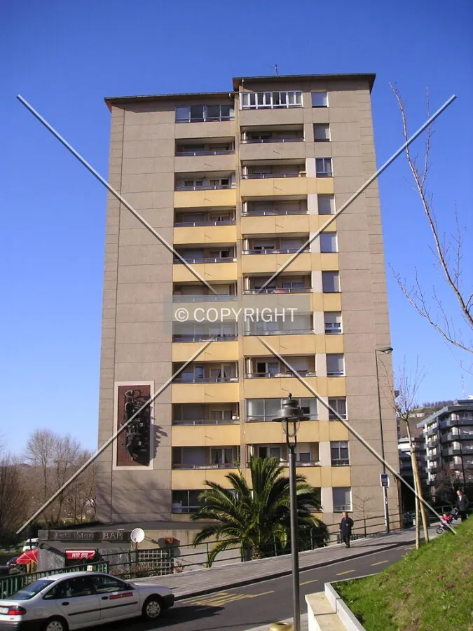 Side view with a sculpture in the facade
