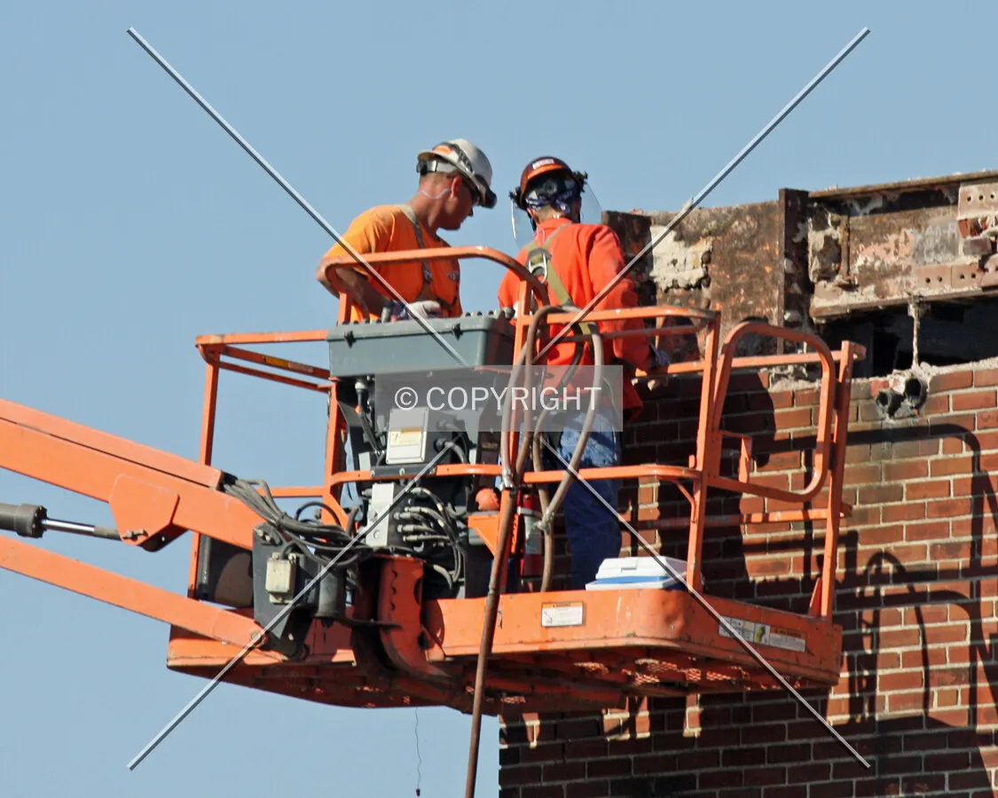 Men working on the north end during demolition; August 11, 2011