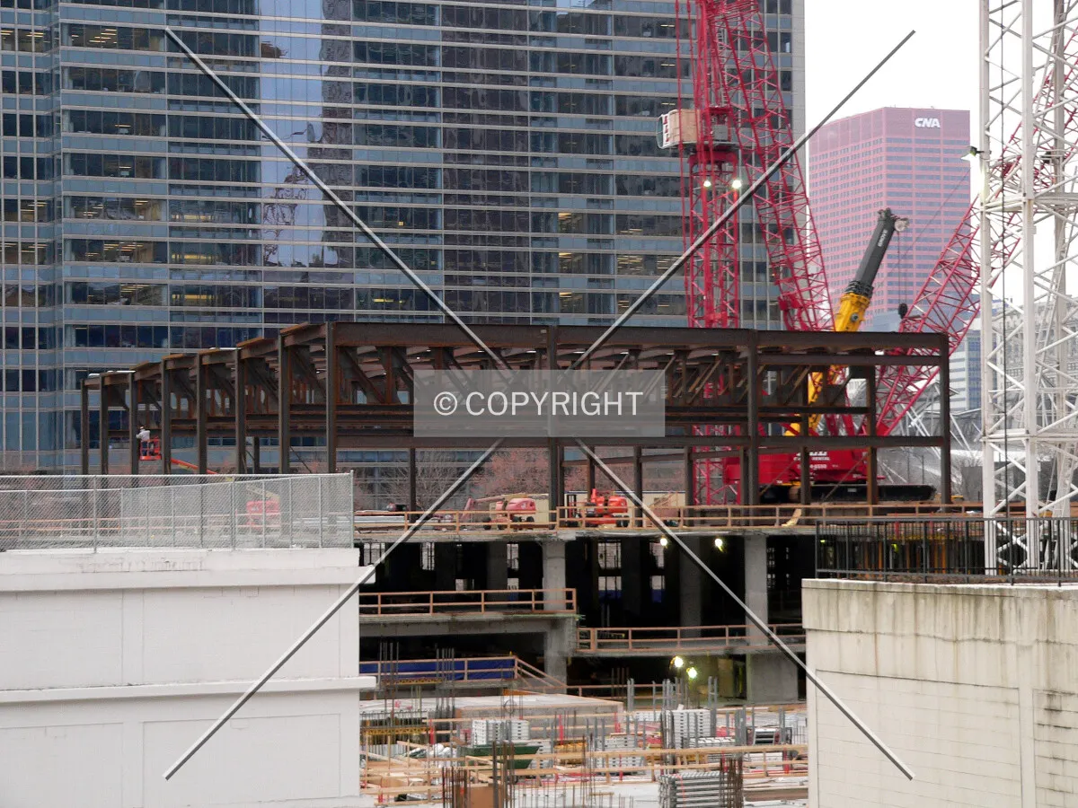 View to the south from Wacker Drive of steel framing for the ballroom area
