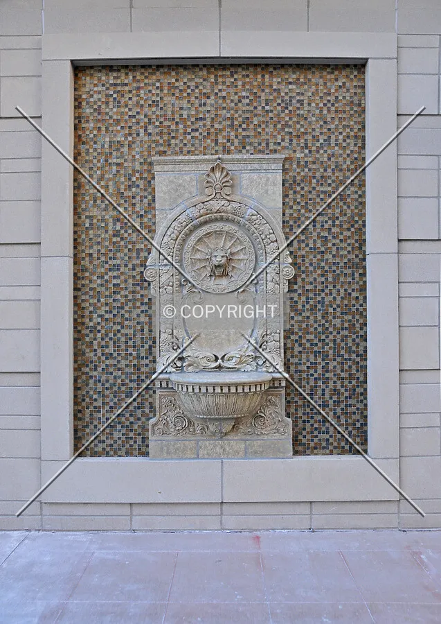 Setting for preserved terra cotta fountain on the north facade. March 21, 2012